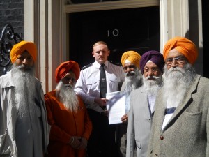 Sikh representatives submitting memorandum at 10 Downing Street on 6 June 2014