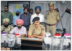 Fatehgarh Sahib SSP Gurmit Singh Chauhan along with other police officers addressing the media persons at Fatehgarh Sahib [September 06, 2013]