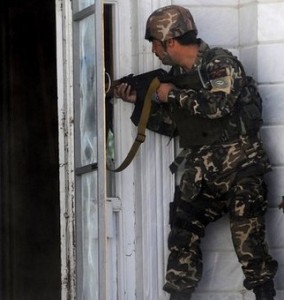 An Afghan security personnel in operation