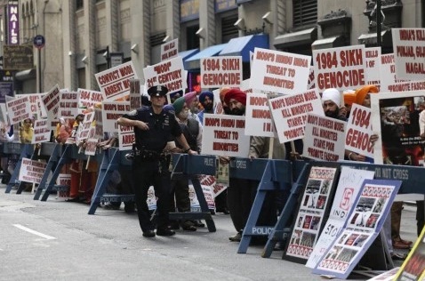 Protesters stage a demonstration across the street from Madison Square Garden.