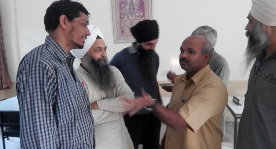 Inamur Rahman (extreme left) of Jamaat-e-Islami Hind interacting with other delegates at meeting for Sikh demonstration in Delhi on 20 Oct 2014