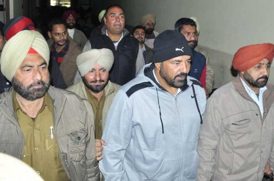 Jagdish Bhola in police custody [File Photo]
