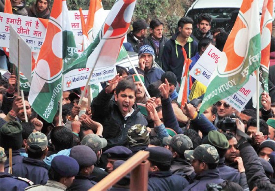 Youth Congress activists protest outside the BJP's office in Shimla