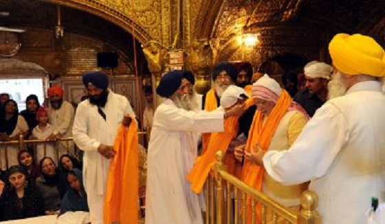 Narendra Modi being offered Siropa inside Darbar Sahib