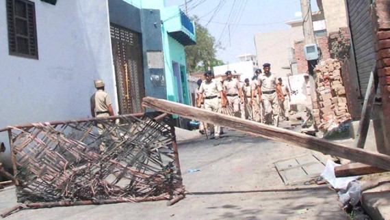 Police personnel patrol the violence-hit Atali Village near Ballabgarh in Faridabad