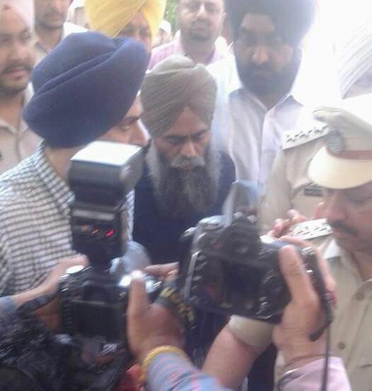 Prof. Devender Pal Singh Bhullar in police custody after his arrival in Amritsar