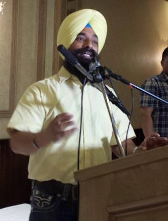 A Sikh youth activist Harpreet Singh speaking at the confernece