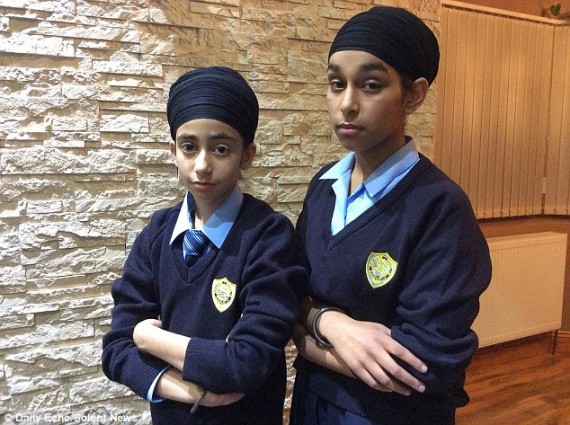 Simranjot Kaur, 13, (right) and 11-year-old Prasimran Kaur, (left) who aren't related, returned to St Anne's Catholic School in Southampton, Hampshire, wearing dastars | Source Daily Mail