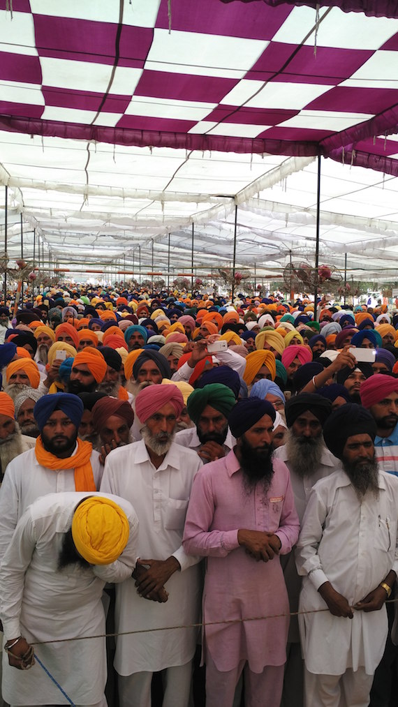 Sikh Sangat lines up to pay obeisance to Guru Granth Shaib at Bargari village