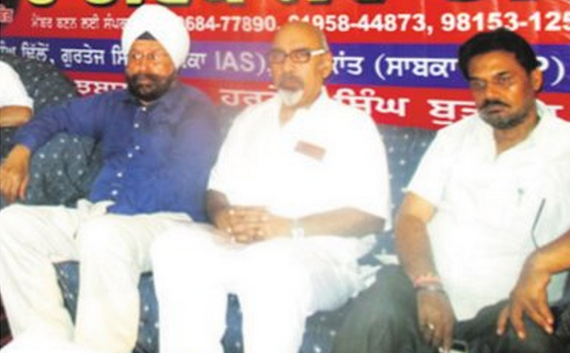 Shashi Kant (C), Gurdarshan Dhillon (L) and another