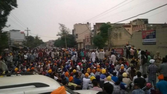 Sikhs protesting outside Adampur police station against beadbi of Guru Granth Sahib