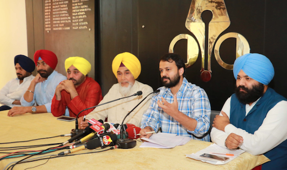 AAP leaders addressing a press conference in Chandigarh