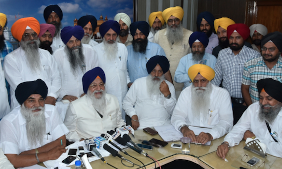 SGPC chief Avtar Singh and others addressing media after holding executive committee's meeting