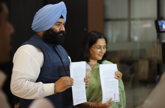 Himmat Singh Shergill and Chandra Suta Dogra releasing AAP's White Paper on Punjab's Power Scenario