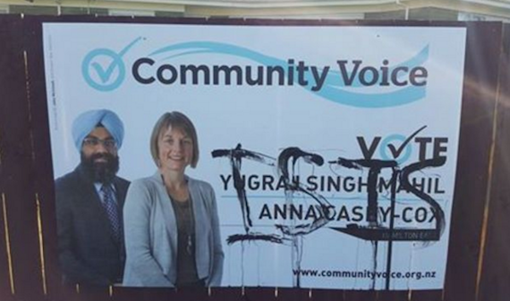 The billboard showing Yugraj Singh Mahil and another candidate Anna Casey-Cox which was defaced and has now been removed