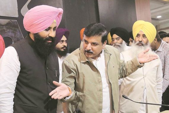 Sanjay Singh of AAP party leader with Bains brothers of Lok Insaaf Party during a press conference on pre-poll alliance, November 21 2016. Express photo by Jaipal Singh
