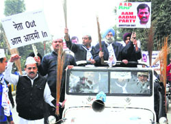 AAP activists led by HS Phoolka take out a rally in Amritsar on February 16, 2014.