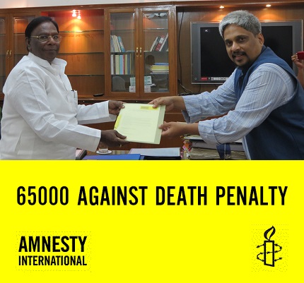 G Ananthapadmanabhan, Chief Executive, Amnesty International India, submits a petition with signatures from 65000 people supporting the Anti-Death Penalty campaign, to V Narayanasamy, Minister of State in the PMO, on 18th September, 2013 in New Delhi.