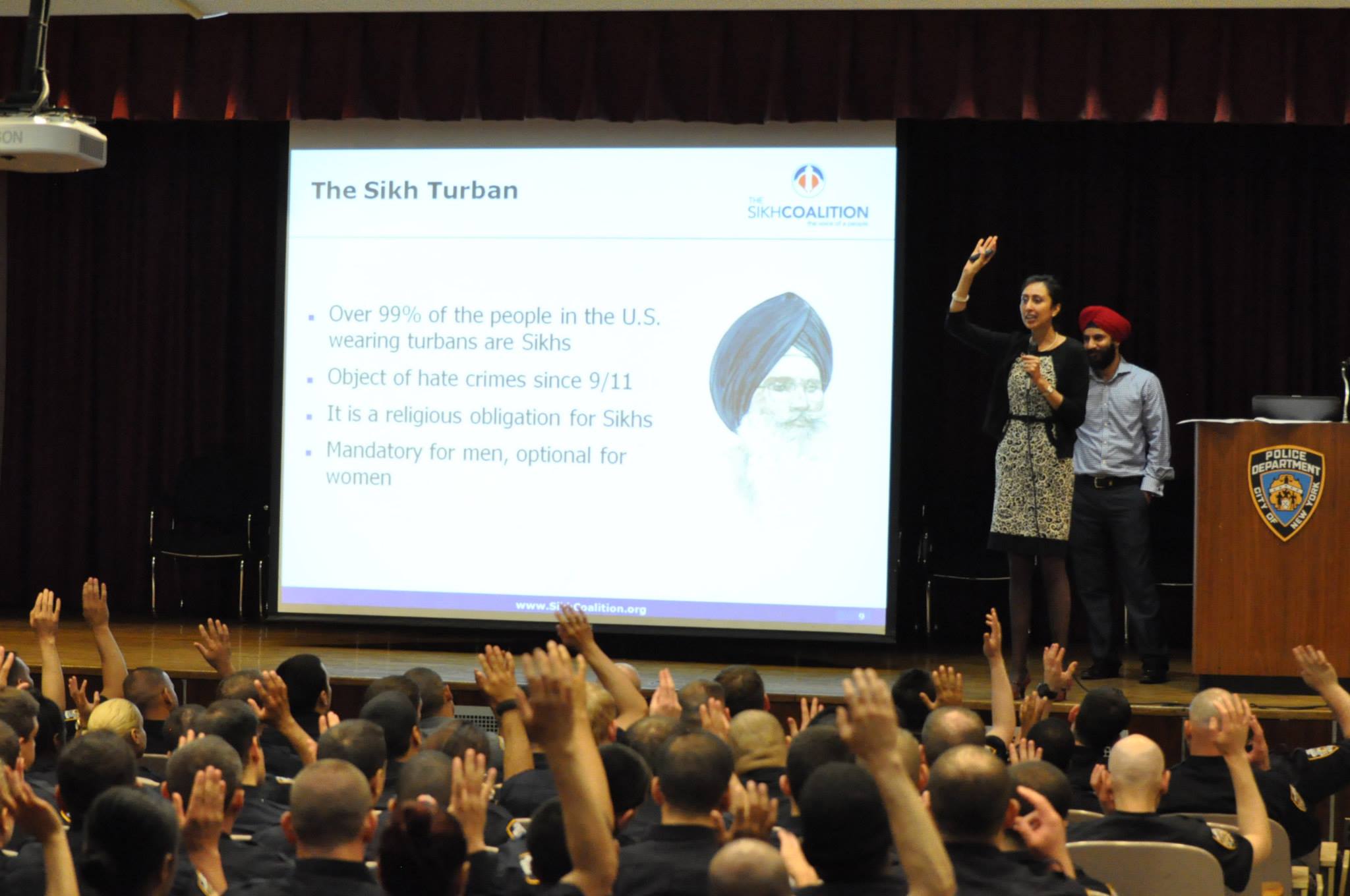 Jaspreet Bansal and Kiratbir Singh lead the presentation on Sikhs and Sikh practices for the new NYPD officers.