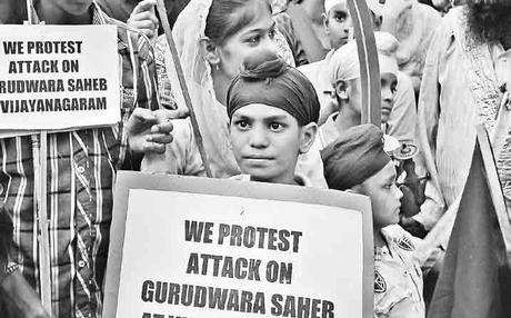 Sikhs staging a demonstration at Gurudwara Sahib Ameerpet in Hyderabad in protest against the attack on a Gurudwara by Samaikyandhra protestors in Vizianagaram