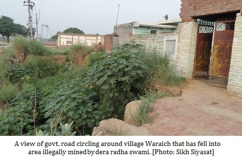 A view of govt. road circling around village Waraich that has fell into area illegally mined by dera radha swami